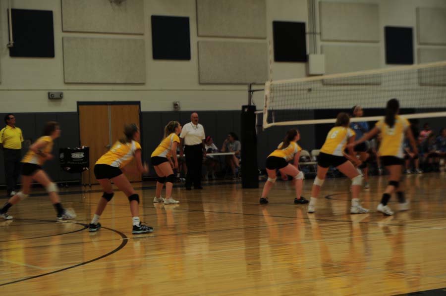 During their game against East, the freshman volleyball team got ready to make a few plays. The freshman girls were fired and up and made excellent moves on the court.