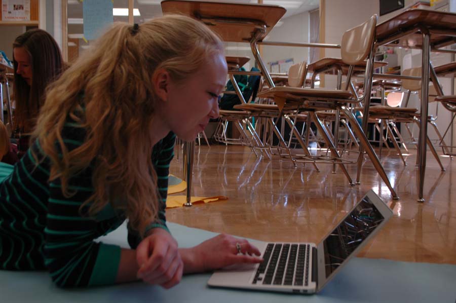 In room 195, Senior and Editor in Cheif Julia Rose looks up images on her macbook to find a stud muffin for their Marvelous Muffin Monday in the fall. Once they have their muffin sale, theyll be able to start looking for artwork to display in the magazine.