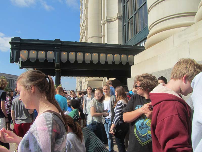 Students from Mr.Larenzos classes wait outside Union Station after watching the movie Jerualsum. The students will then go to Crown Center for lunch.