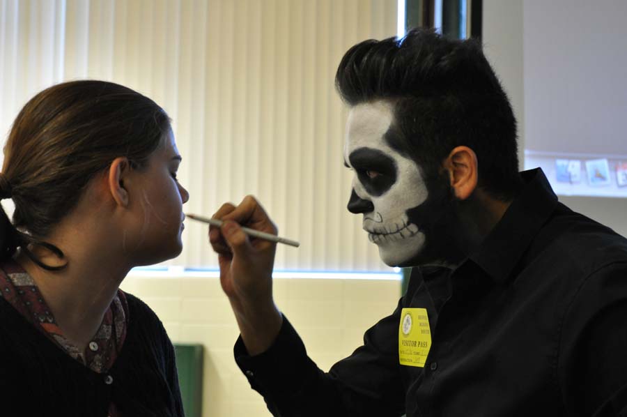 Hugo Ximello Salido, a Mexican Impressionist - abstract painter, came to South to do speak and paint and a few students faces in all the Spanish class to learn about the Day of the Dead holday. junior Callie Ross had her face panited by Salido.
