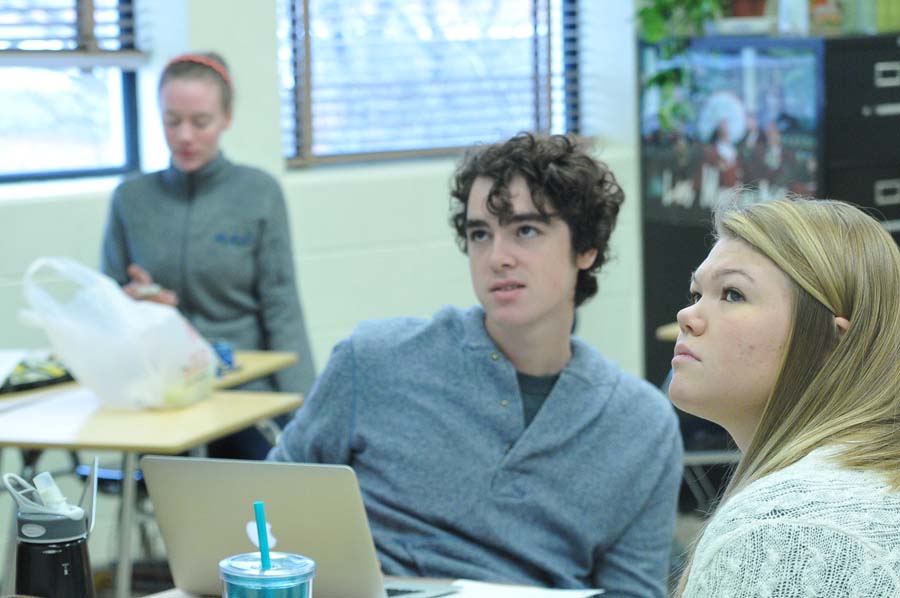 Isaac Lanan describes his decoration ideas for the upcoming WPA dance to other STUCO members. The theme for the dance was Winter Wonderland and Lanan described his designs with euthusiasm.