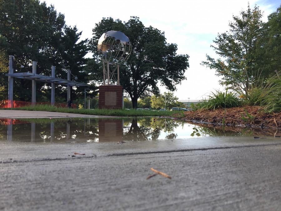 On Thursday, Sept. 10  storms have passed through pelting streets and homes. At the front of the school, puddles were on the sidewalks showing how much it rained at 8 a.m. that morning. photo by Trevor Tolar 