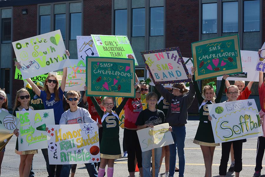 Fellow Shawnee Mission elementary kids join our SMS parade with enthusiasm. They made signs and held them high near the front of the line.