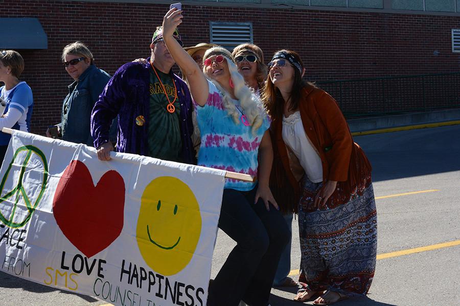 SMS counselors pose for a 1965 selfie! With their themed outfits, they made a fun addition to the parade.