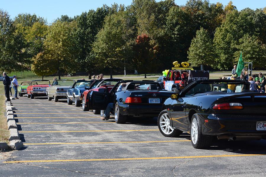 Cars, cars, and more cars! Many volunteers drove their classics in support of the first ever homecoming parade.