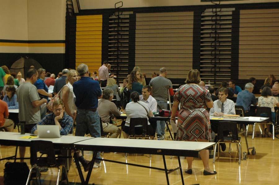 Many parents have attended the open parent teacher conferences. Almost every teacher constantly has a line.