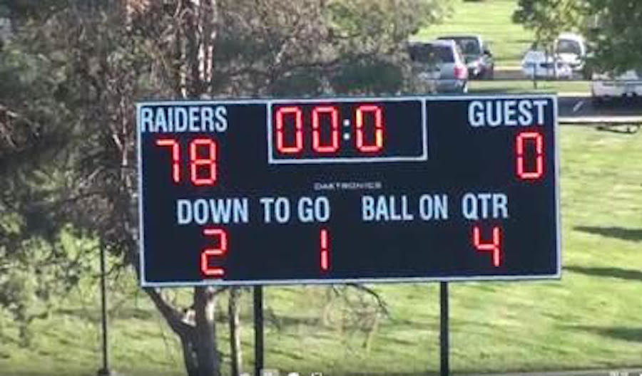 The Final outcome for the freshman football team against Lawrence High is reflected on the scoreboard.   
