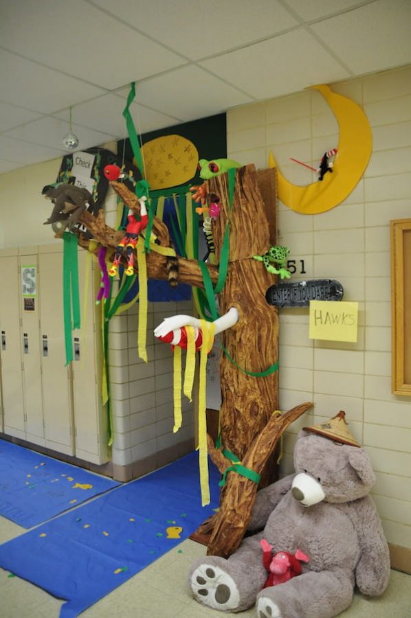 Business teacher Chris Thompson and his students created a paper mache tree and walkway. Their door won second place.
