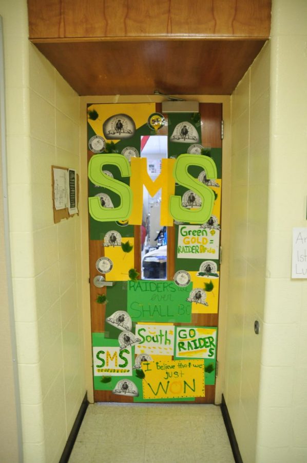 Art teacher Jill Oliver used her art skills to put together this green and gold door.
