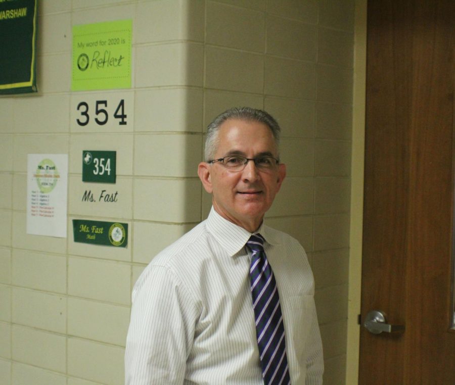 Dr. Johnson outside room 354 which was one of the few math rooms with 2-3 classes of kids in it. 