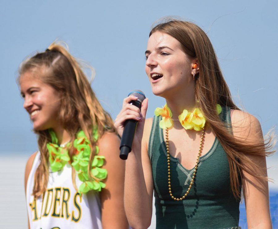 Performing a skit, senior Hanna Velicer works with senior Anna Kramer to entertain the crowd at the assembly. Velicer is a part of souths Pep Club that works to up the school spirit levels.  I joined pep club because I wanted to do something fun and enjoy my senior year Velicer said.