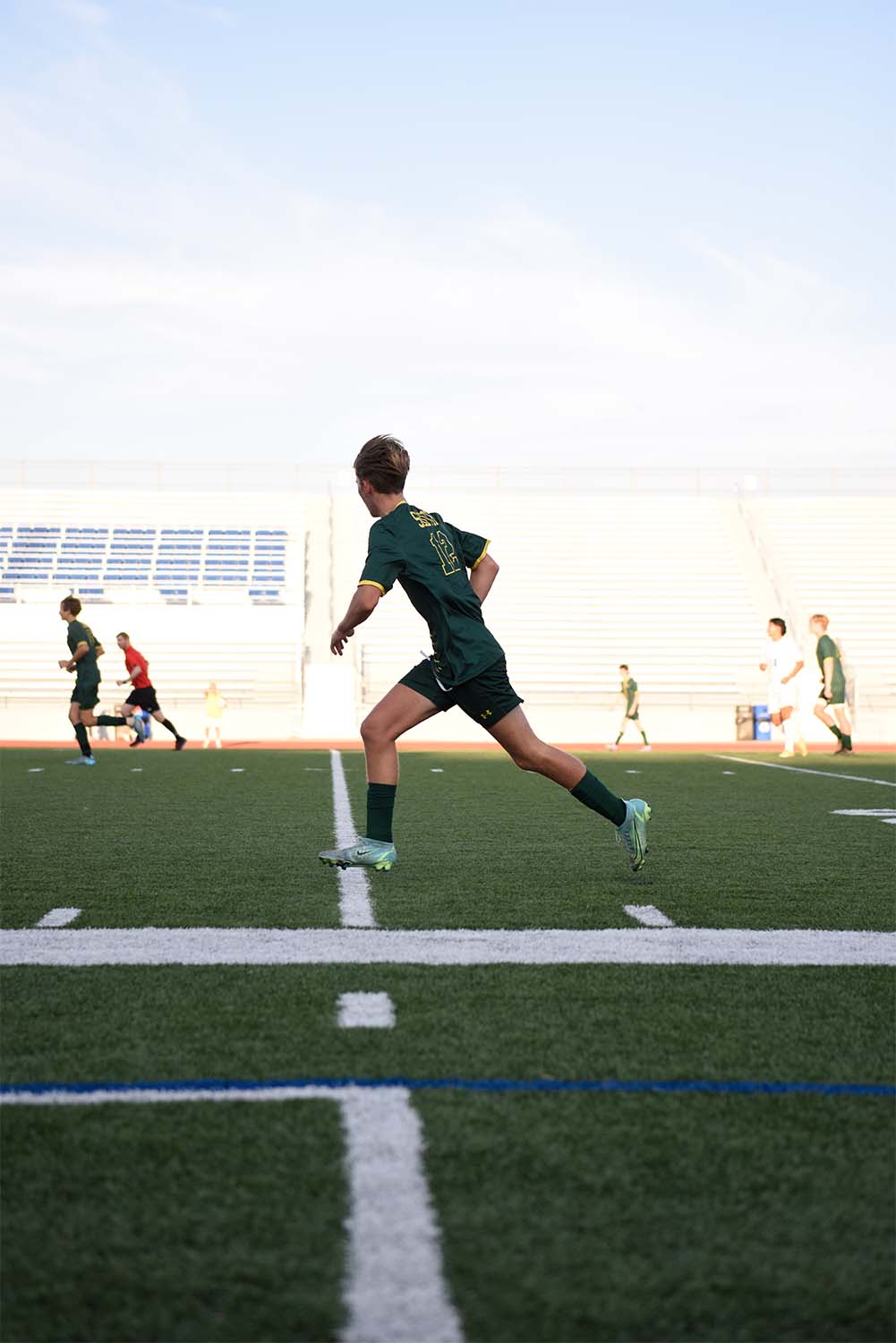 Running across midfield, junior Graham Ziegler waits for a pass during the varsity game against Sumner Academy.