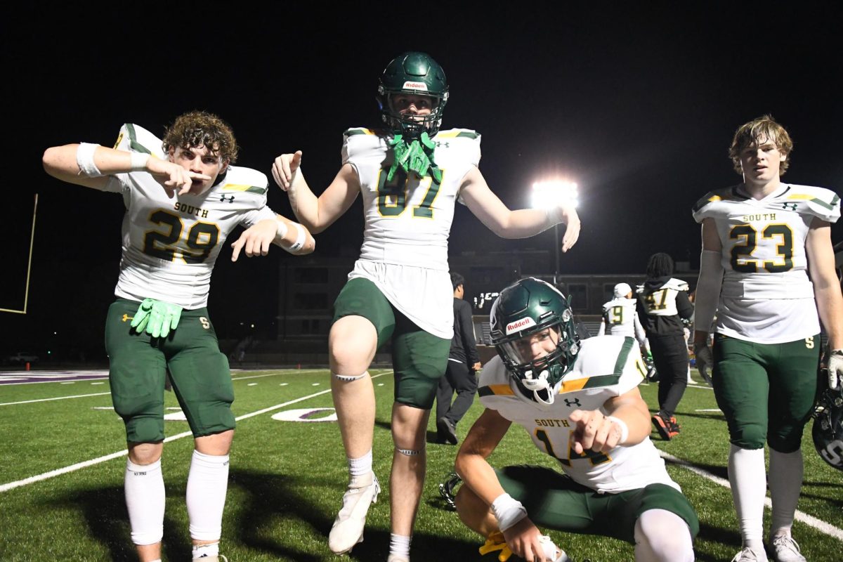 The Raiders strike a pose on the sideline after a huge 31-15 win against the Pittsburg Dragons on September 13