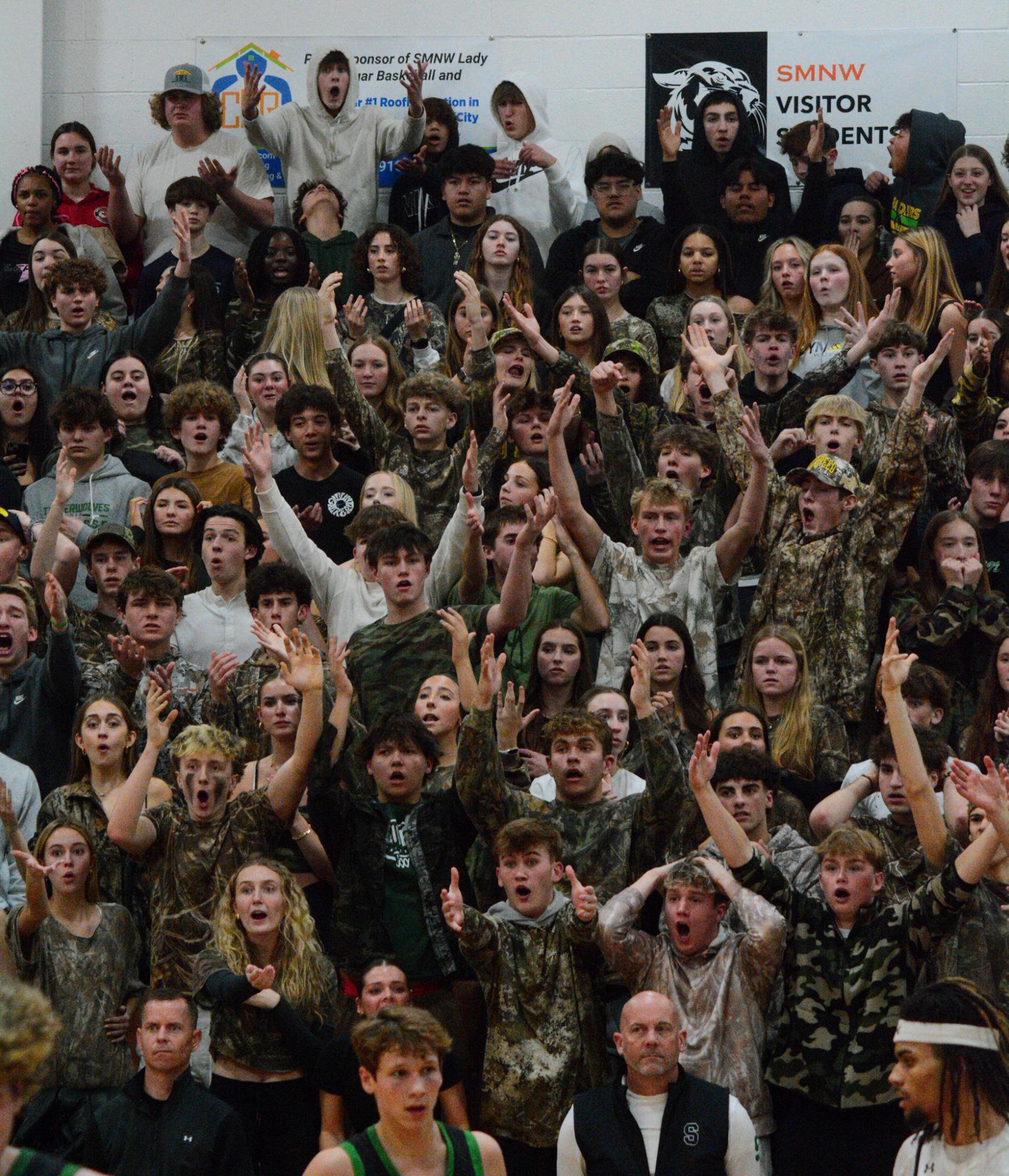 The Shawnee Mission South student section reaction after our South varsity basketball team scores a point against Shawnee mission Northwest. 