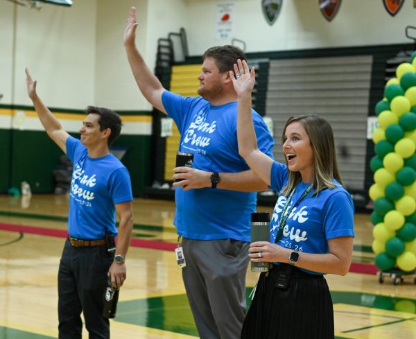 Associate Principals Kris Meyer, Jake Bauer, and Ben Richardson in the South auditorium welcoming Freshmen on their first day of school Monday, Aug 11th.