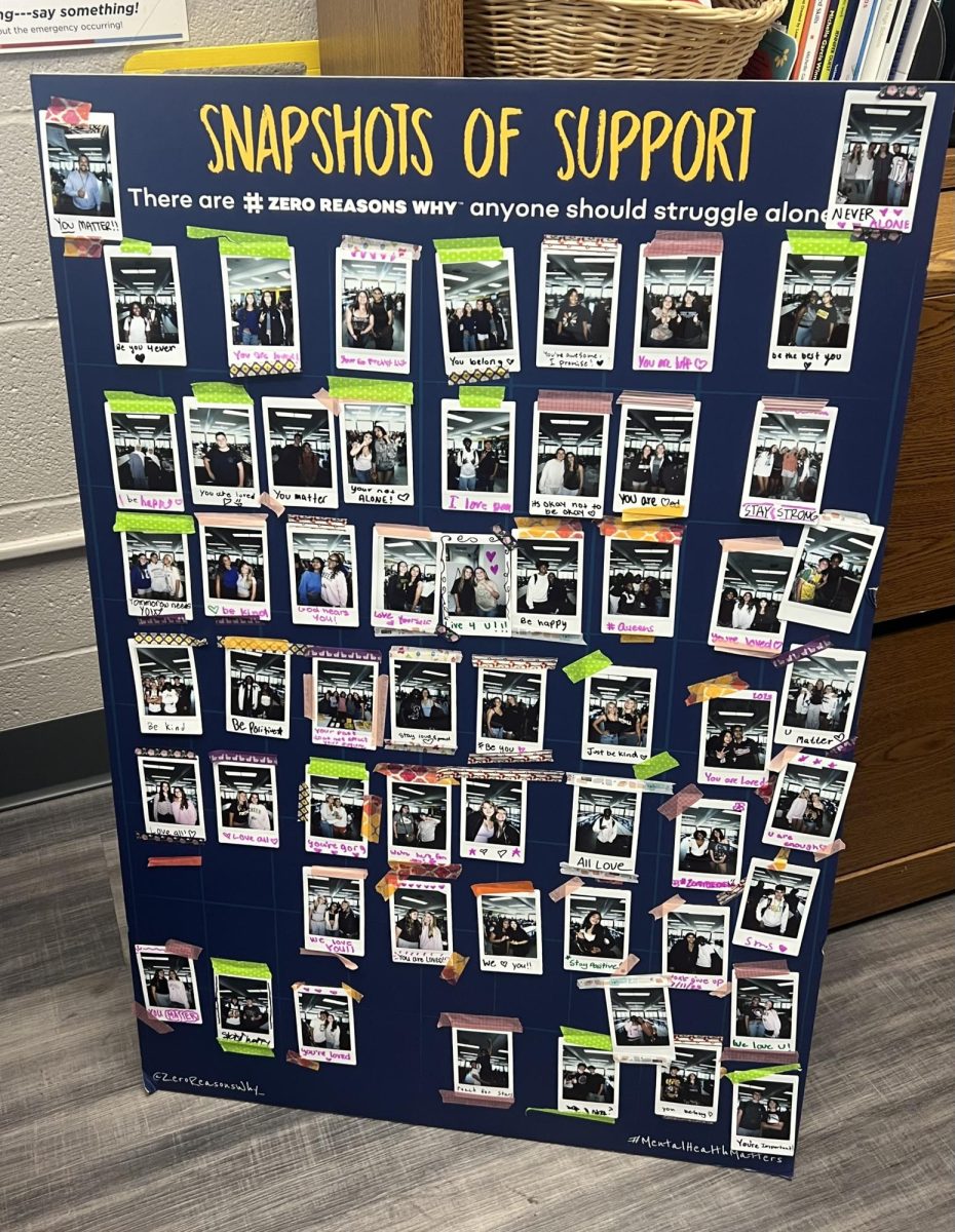 Students took polaroids and attached them to a poster board in the lunchroom.