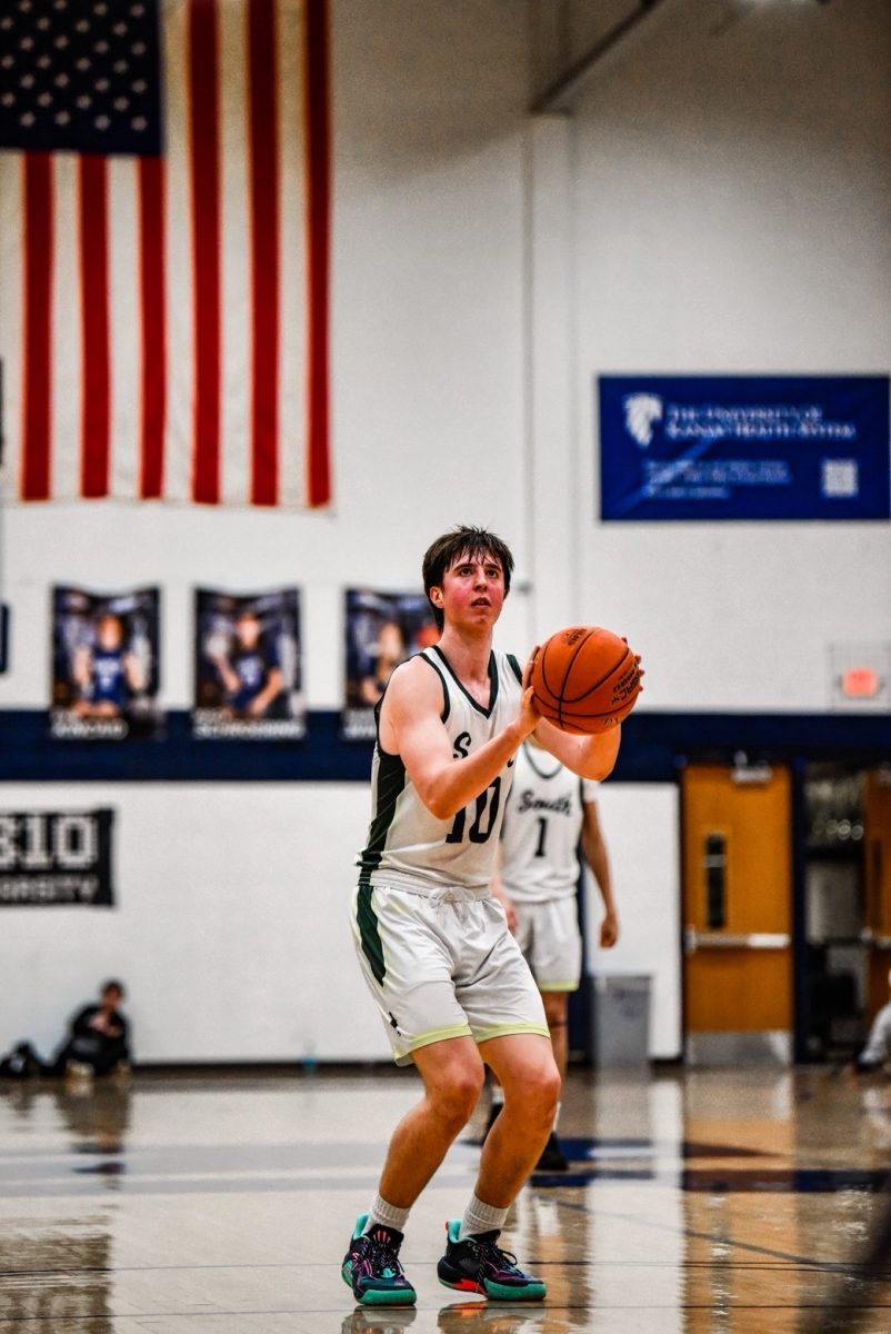 Senior Ben Allen at the line to make one of eight free throws he had during the 4th quarter against Lee's Summit, Saturday, Jan. 3 at Blue Valley North