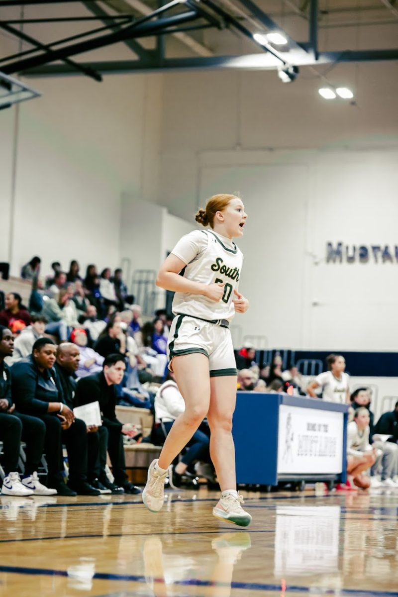 Junior Ella jack standing in the corner during a Lady Raider win against Notre Dame de Sion Saturday, Jan. 3 at Blue Valley North.